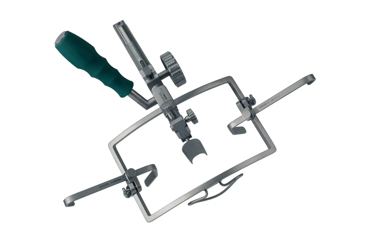 Surgical retractor with green handle and adjustable metal arms for secure wound retraction and improved visibility in the surgical field.